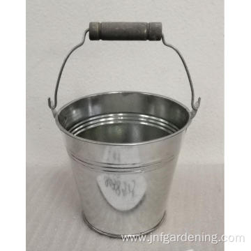 Metal round bucket with metal handle